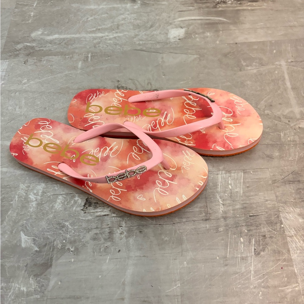 Bebe Pink Script Flip Flops with Rhinestone Accent